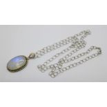 A silver and quartz pendant and silver chain