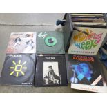 A box of 7" vinyl singles, mainly 1980's