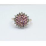 A 9ct gold, pink sapphire and diamond cluster ring, 3.7g, P