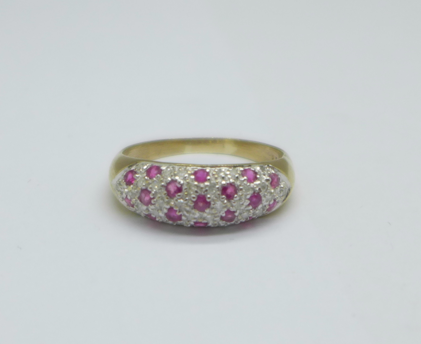 A 9ct gold, ruby and diamond ring, 3.3g, T