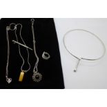 A 925 silver choker, two silver pendants and chains, an amber pendant with chain, a silver ring