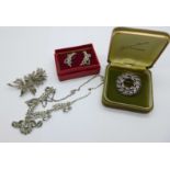 Vintage silver and marcasite jewellery; a necklace, a flower brooch, one other brooch and a pair