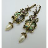 A pair of Scarab beetle shaped earrings