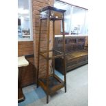 An early 20th Century oak coat stand