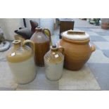 Three stoneware flagons and one other