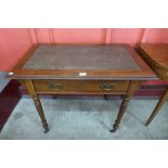 A Victorian mahogany and leather topped single drawer writing table