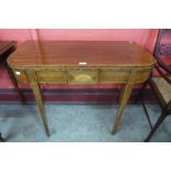 A George III inlaid mahogany D-shaped fold over tea table