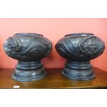 A pair of Japanese bronze urns