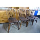 A set of four 19th Century ash and elm Windsor kitchen chairs