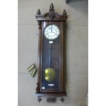 A 19th Century style mahogany Vienna wall clock