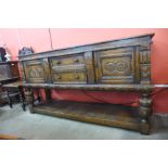 A 17th Century style carved oak dresser