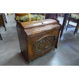 A Victorian figured walnut Canterbury