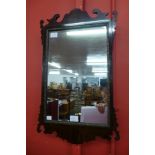 A George III mahogany and parcel gilt framed mirror