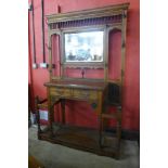 A large Victorian Aesthetic Movement carved oak hallstand