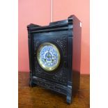 A Victorian Aesthetic Movement ebonised bracket clock