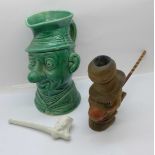 Three Ally Sloper items, a wooden pipe bowl, a clay pipe and a jug, (jug a/f)