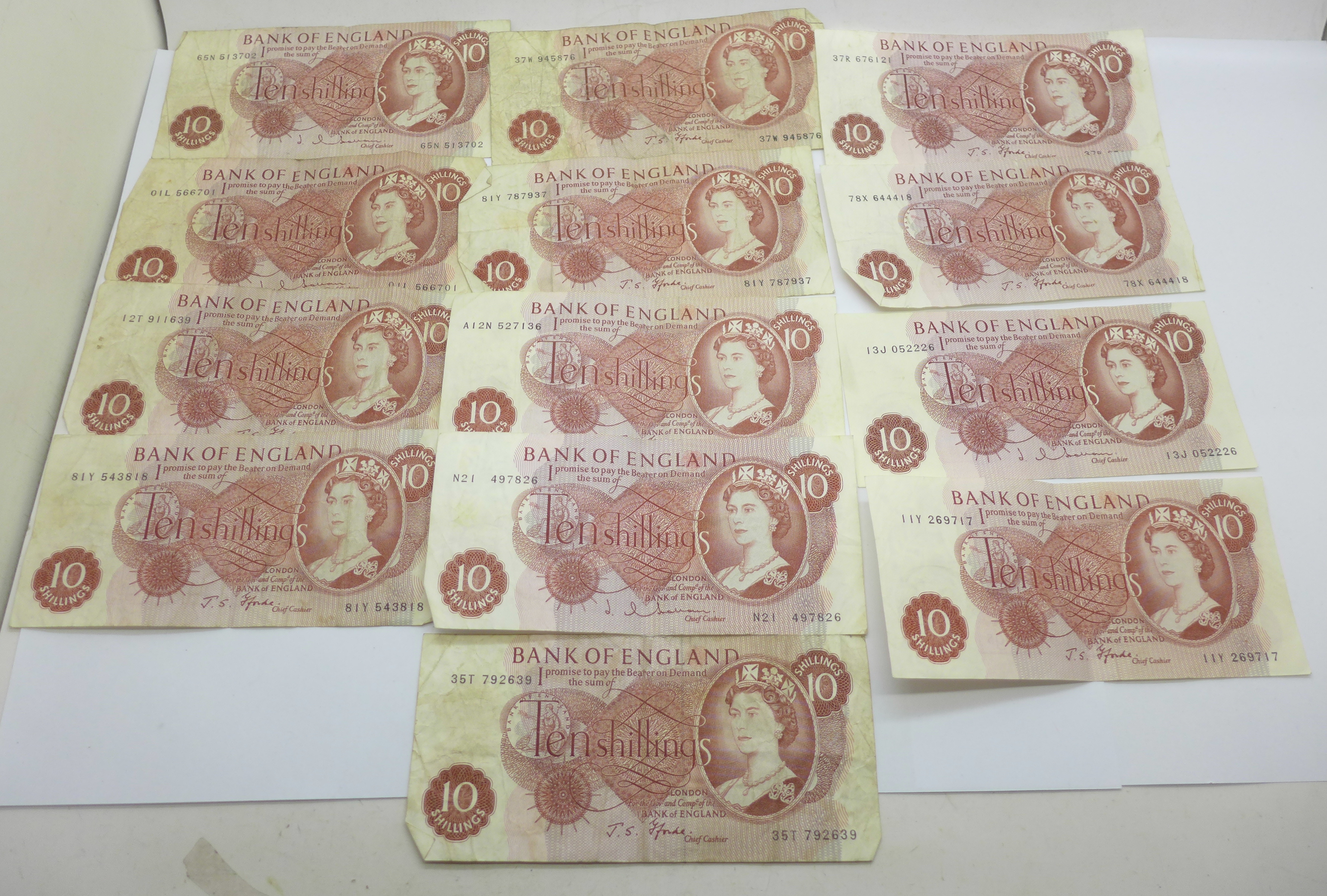 Thirteen ten shillings bank notes