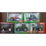 Five model tractors, Siku, Ertl and Britains, boxed