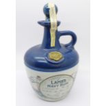 A Lamb's Navy Rum bottle with contents