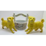 Two Chinese export model dogs and a porcelain basket