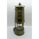 An Eccles miner's safety lamp
