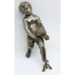 A cast metal figure of a cherub, no base