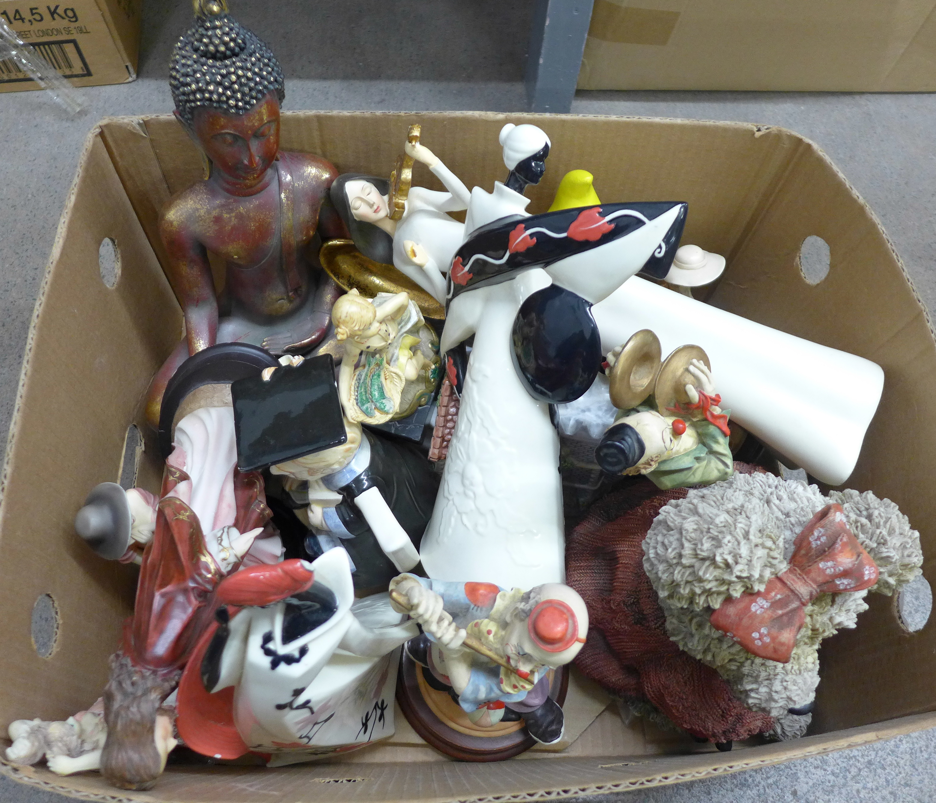 A collection of items including figures, teapots, etc. **PLEASE NOTE THIS LOT IS NOT ELIGIBLE FOR