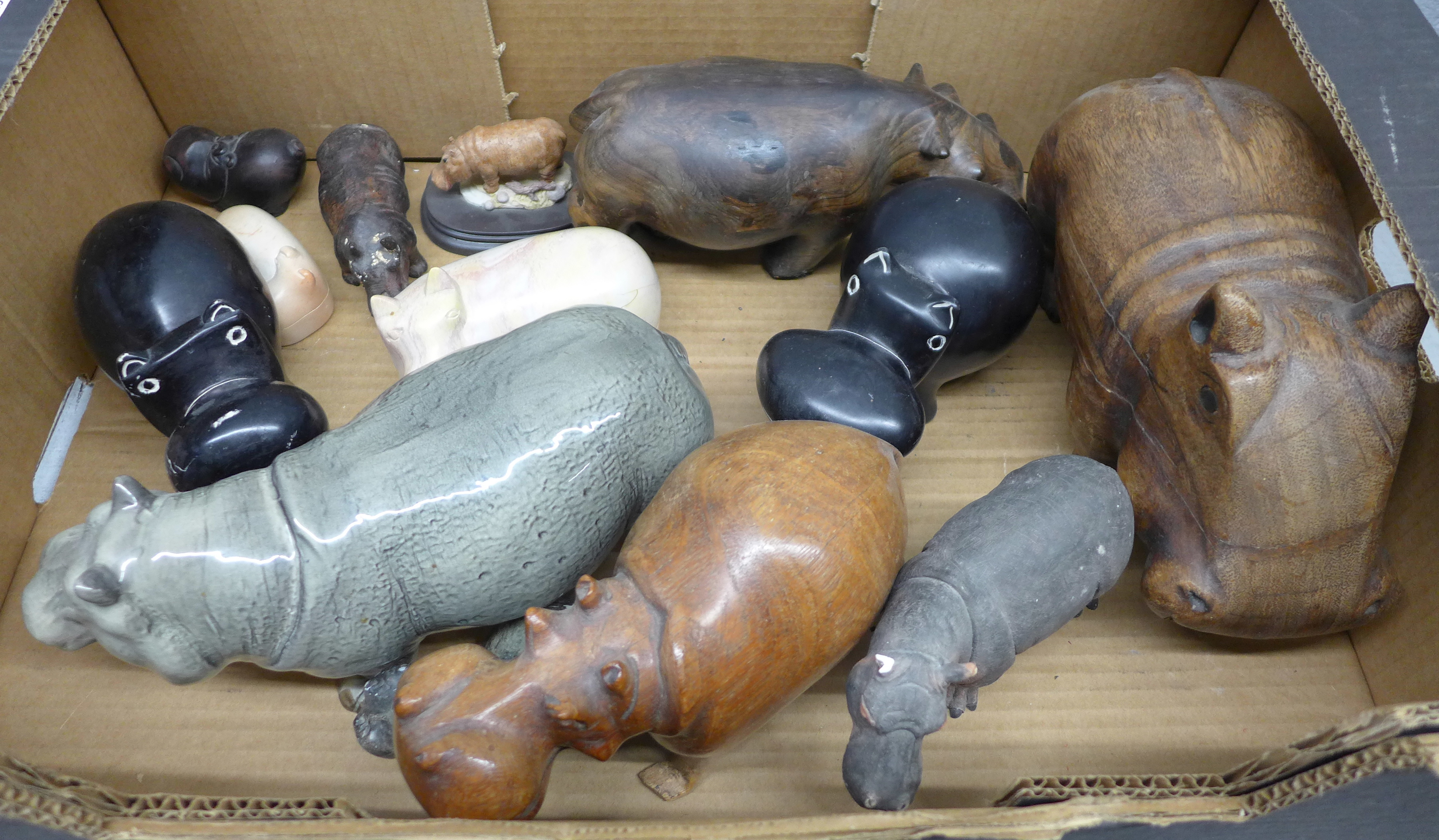 A collection of hippopotamus figures **PLEASE NOTE THIS LOT IS NOT ELIGIBLE FOR POSTING AND