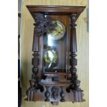 A 19th Century walnut Vienna wall clock