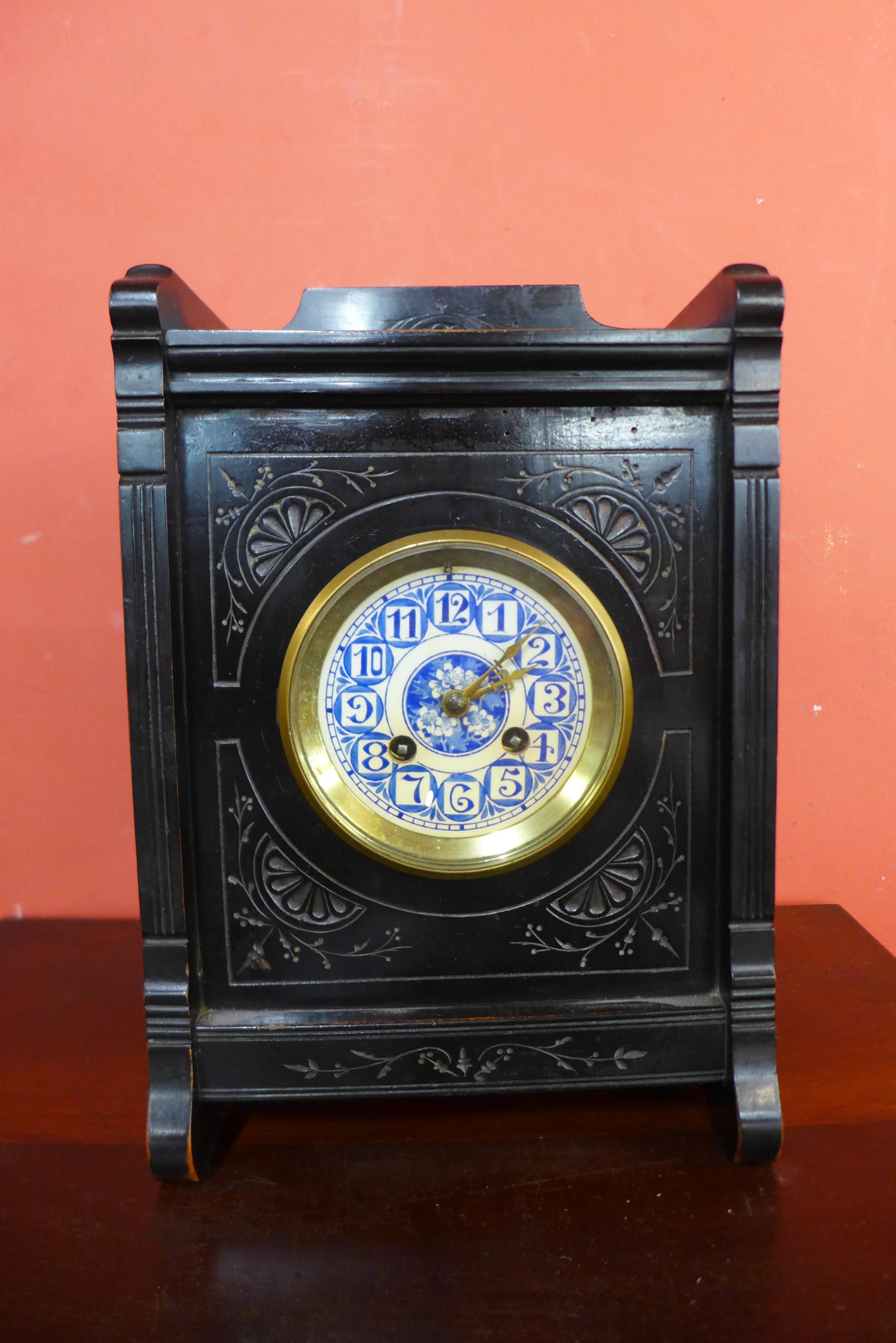 A Victorian Aesthetic Movement ebonised bracket clock