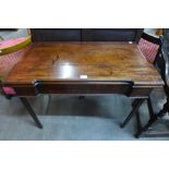 A George III mahogany rectangular fold over card table