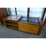 A teak, glass and tiled topped coffee table