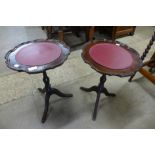 A pair of mahogany tripod wine tables