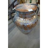 A North African copper urn with lid