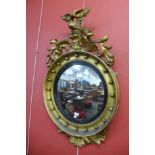 A Regency gilt framed circular convex mirror