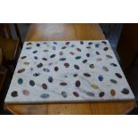 An inlaid specimen marble table top