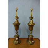 A pair of large brass table lamps