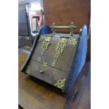 A Victorian mahogany and brass coal scuttle
