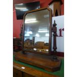 A Victorian Aesthetic Movement pitch pine toilet mirror