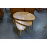 An Ercol Blonde elm and beech pebble shaped nest of tables