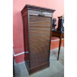 An early 20th Century mahogany tambour front filing cabinet