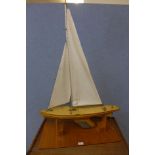 A model of a sail boat on stand