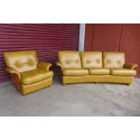 A G-Plan teak and leather upholstered Tulip settee and matching armchair * Please note this lot