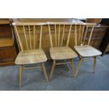 A set of three Ercol elm and beech 608 model chairs