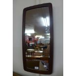 A teak framed mirror