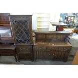 A carved oak court cupboard and a carved oak freestanding corner cabinet