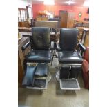A pair of vintage barber's chairs