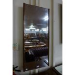 A teak framed mirror