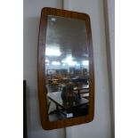 A teak framed mirror