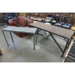 Two industrial steel work benches